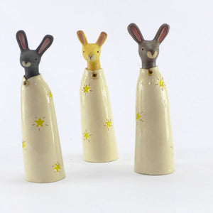 Ceramic dark hare in a starry coat
