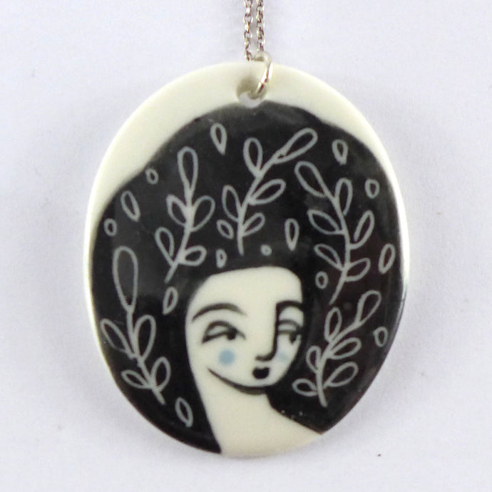 Lady with black hair pendant