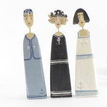 Load image into Gallery viewer, Small figure in a pale blue sailor frock