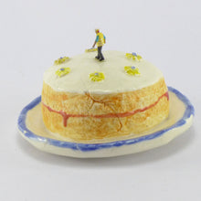 Load image into Gallery viewer, Victoria Sponge being inspected by a workman