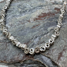 Load image into Gallery viewer, Small silver cinnamon swirl necklace