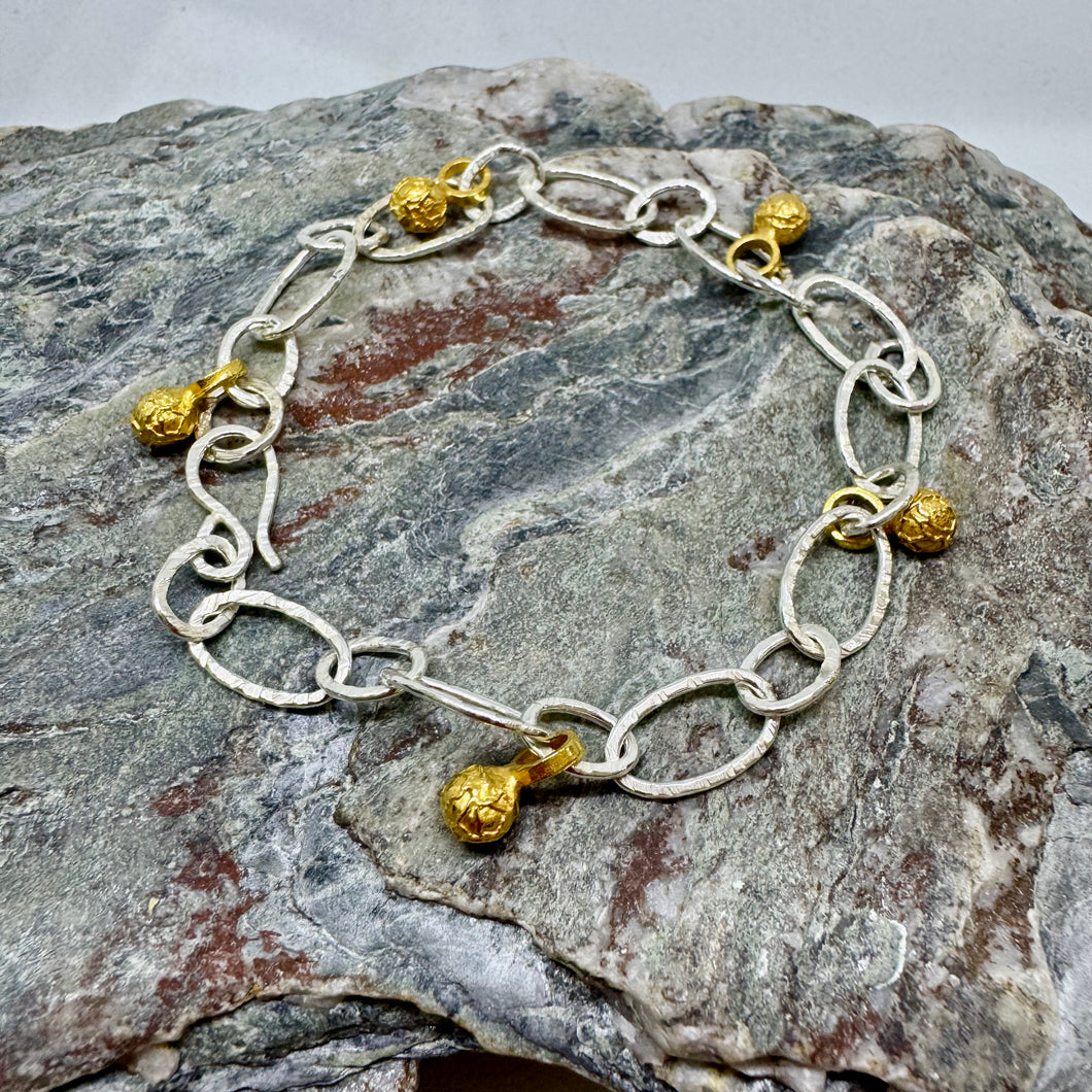 Silver and gilt peppercorn droplet bracelet