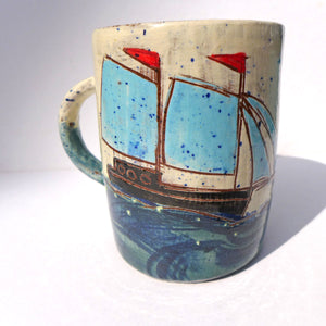 Mug with turquoise sails