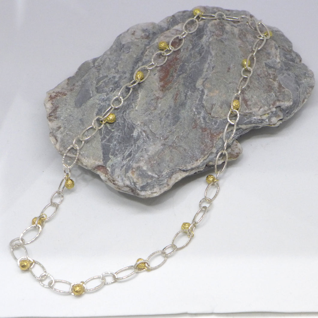 Silver and gilt peppercorn droplet pendant