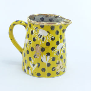Mustard polka dot jug A