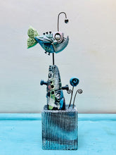 Load image into Gallery viewer, Angler fish on a groyne with flower