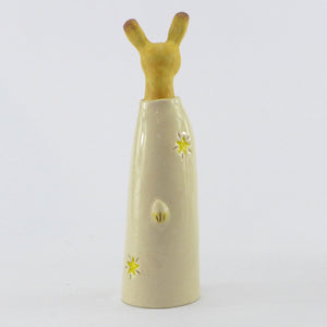 Ceramic golden hare in a starry coat