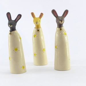 Ceramic golden hare in a starry coat
