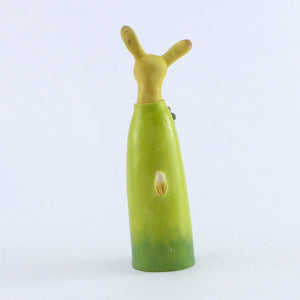 Ceramic hare in a meadow coat with pale pink flowers