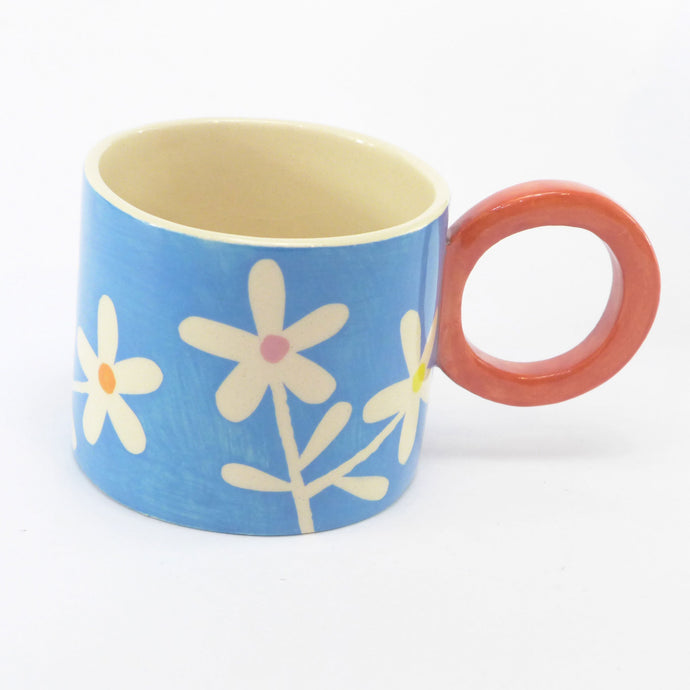 Bright blue daisy mug