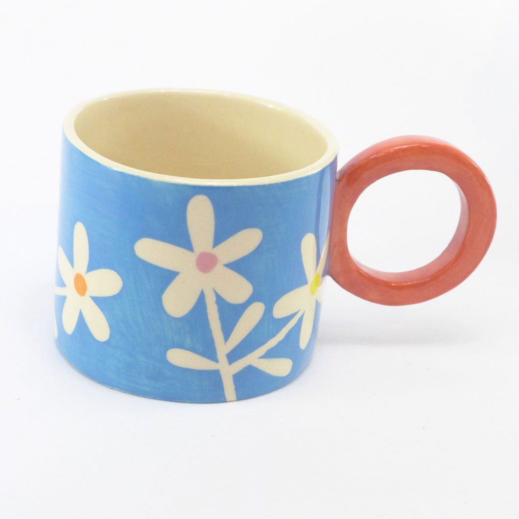Bright blue daisy mug