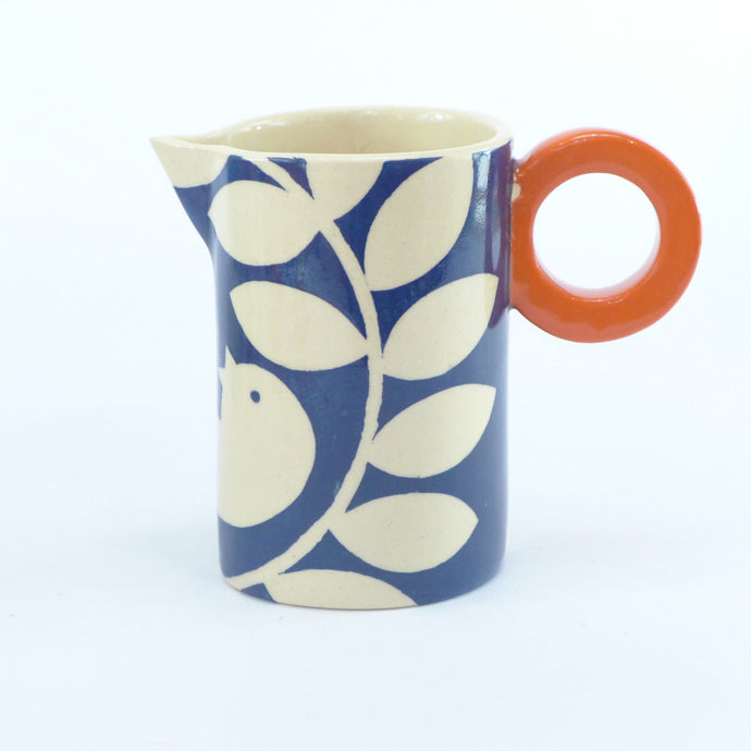 Teal ava bird baby jug