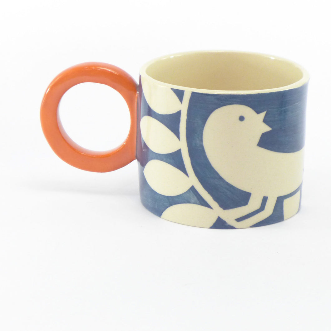 Teal ava bird mug left
