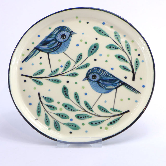 2 blue birds with leaves dish