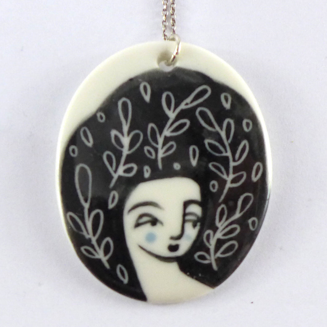 Lady with black hair pendant