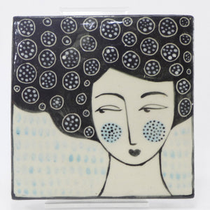 Lady with dark hair tile