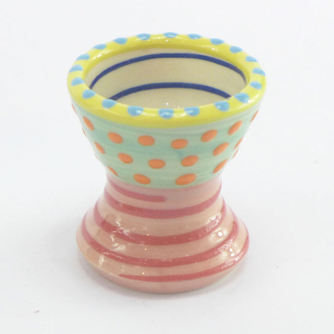 Egg cup green orange spot