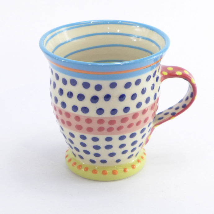 Turquoise edge curved spotty mug