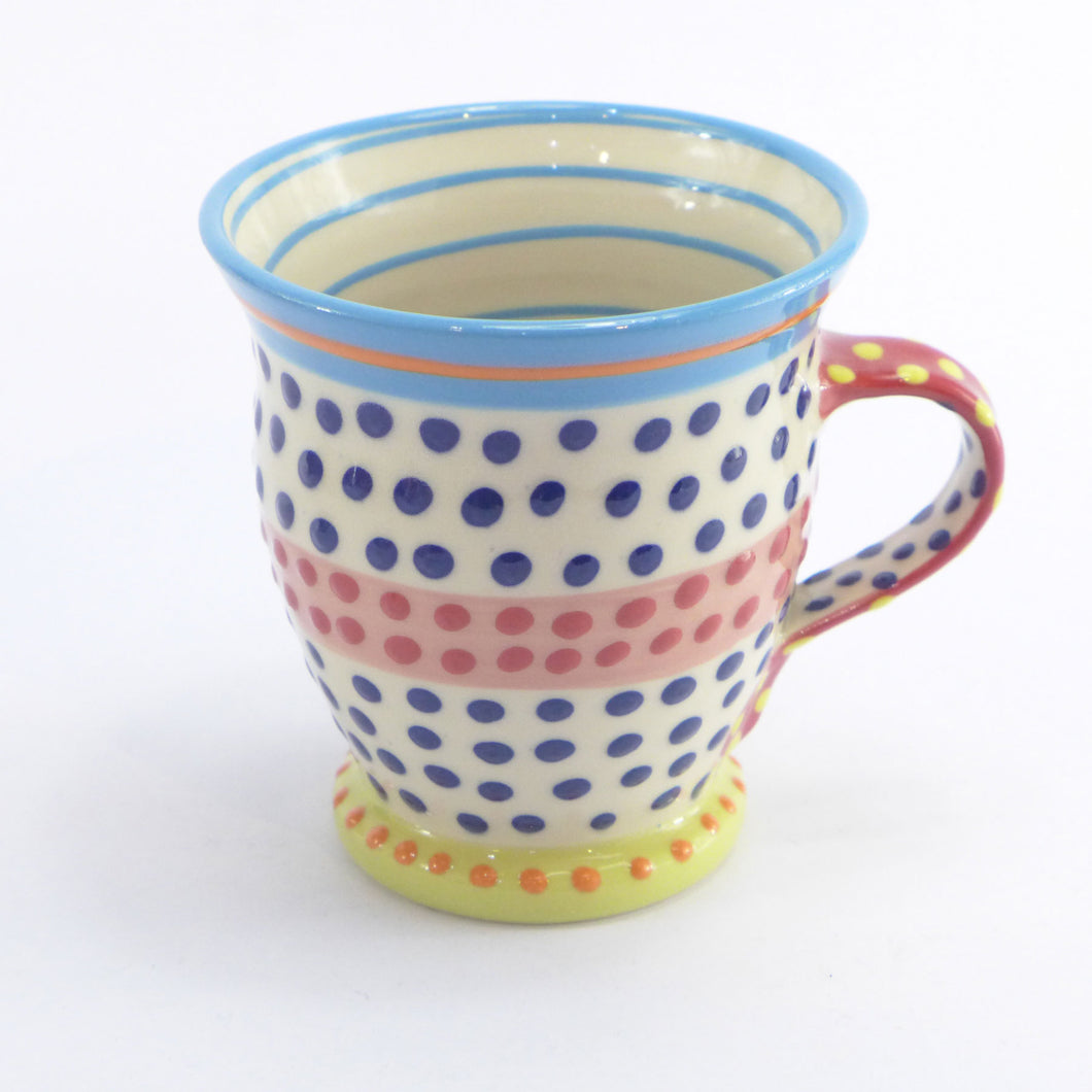 Turquoise edge curved spotty mug
