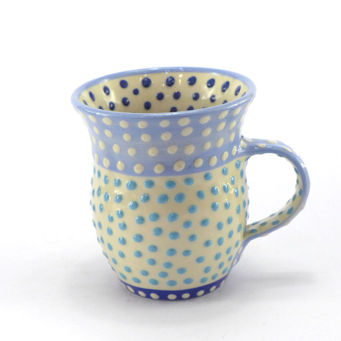 Pale blue curvy spotty mug spots inside