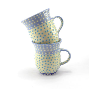Pale blue curvy spotty mug swirl inside
