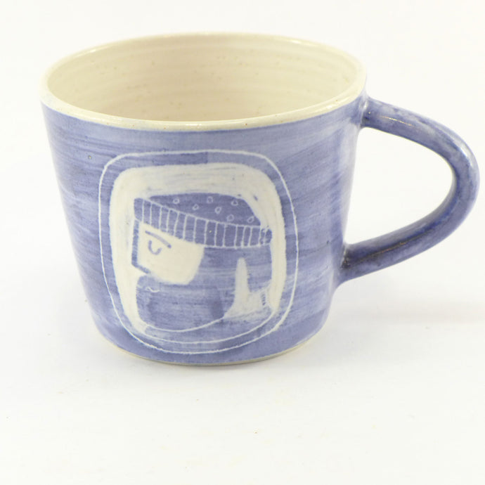 Blue and white mug with sailor