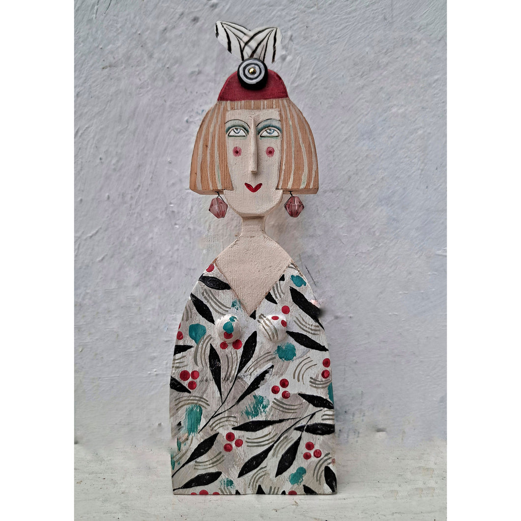 Lady with earrings & a red hat