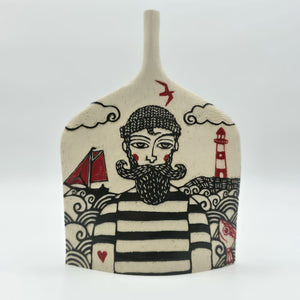 Sailor and Lighthouse Small Vessel