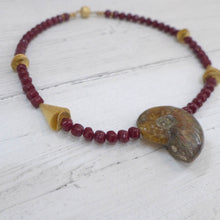 Load image into Gallery viewer, Ammonite, garnet coloured glass and gold plated silver necklace Rokz 4