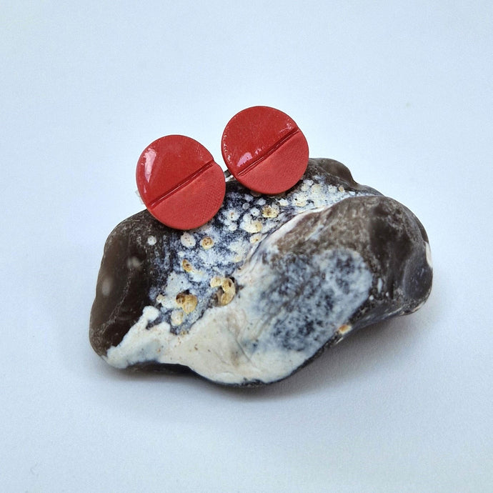 Porcelain studs red glazed