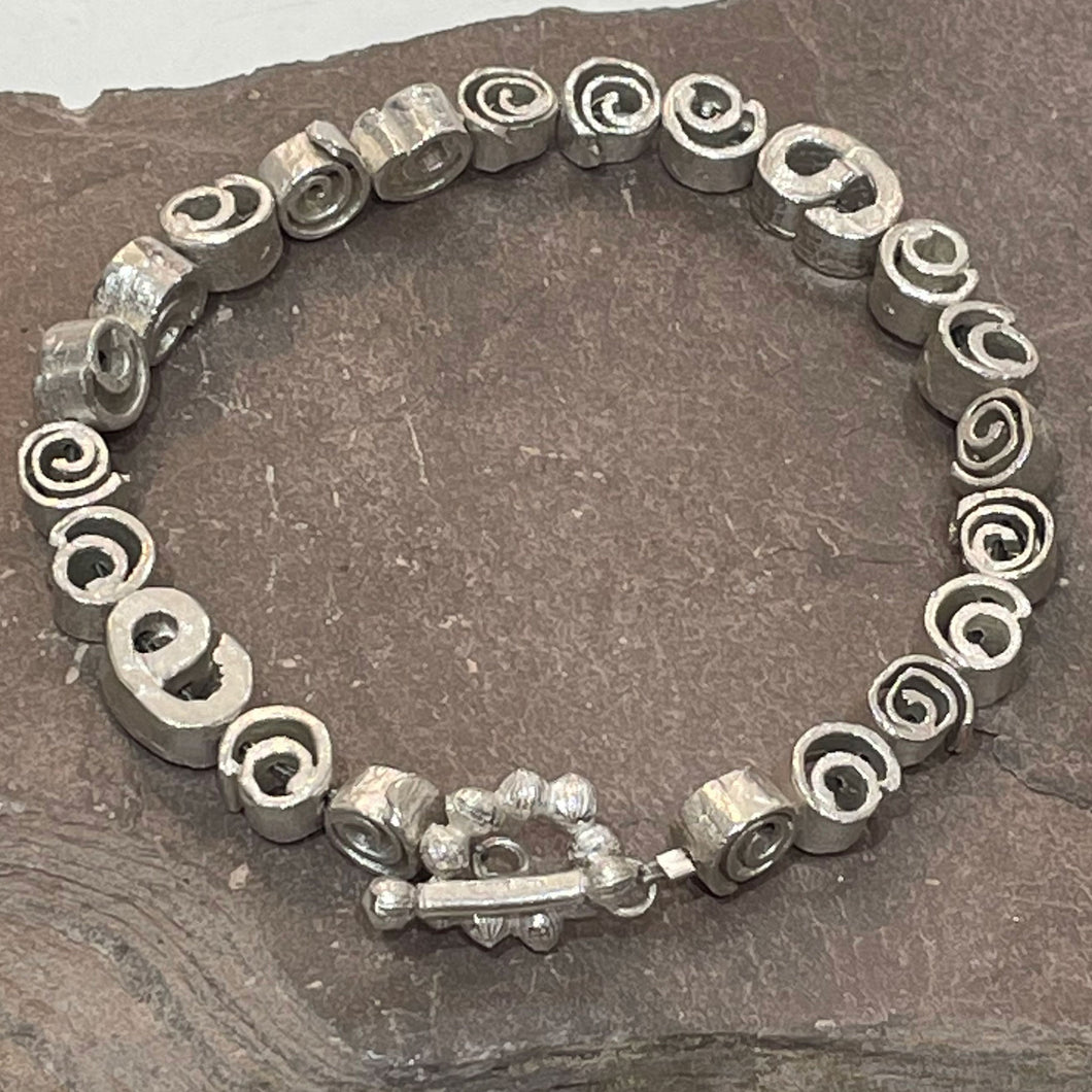 Silver cinnamon swirl bracelet