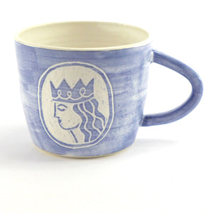 Blue and white mug with mermaid